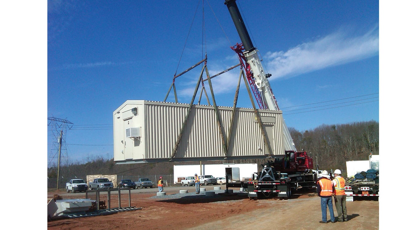 building being set by crane